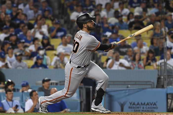 SF Giants infielder David Villar watches a ball after hitting a homer against the Dodgers. (2022)